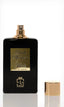 dark Phantom une bouteille de parfum élégante en flacon sur fond blanc avec le bouchon au sol